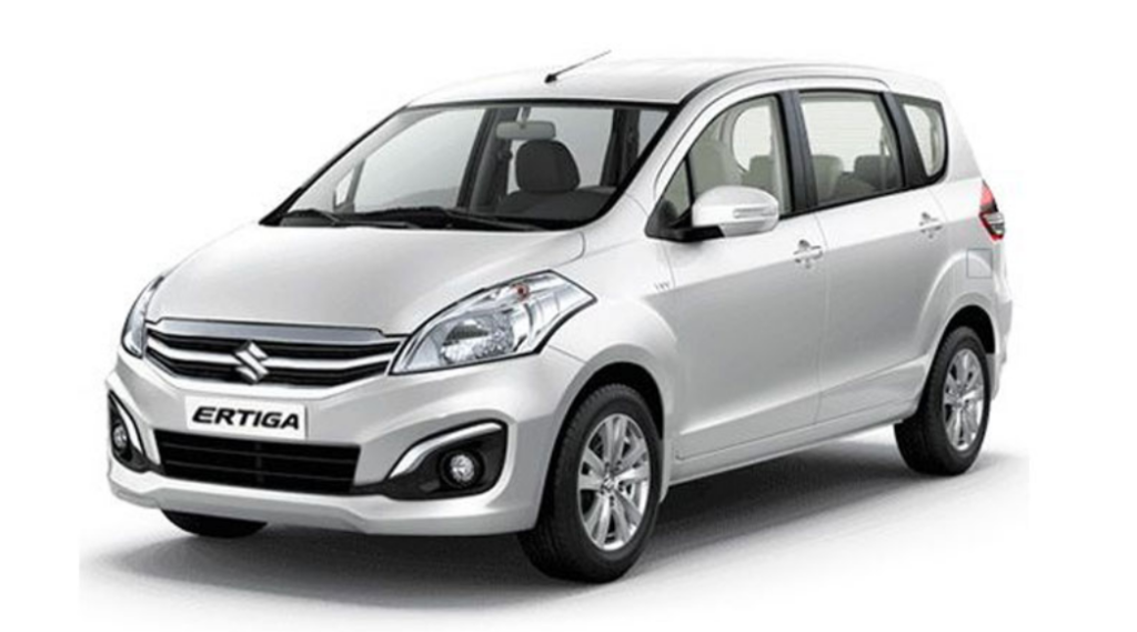 White Maruti Suzuki Ertiga MPV for rental and taxi services.