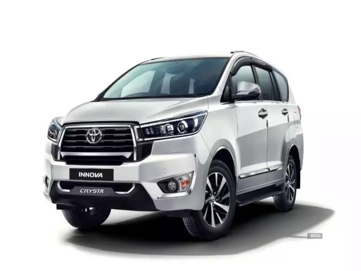 "Toyota Innova Crysta MPV in white, showcasing its premium design and advanced features."